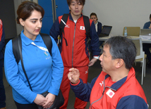 Делегации различных стран проходят аккредитацию на Кубок мира по прыжкам на батуте в Баку. Азербайджан, 3 март, 2016 